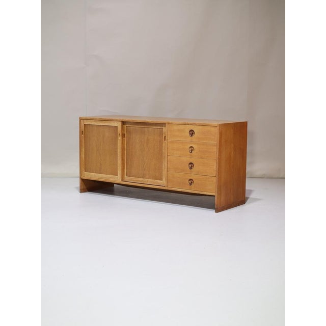 A beautiful and rare sideboard designed by hans j. Wegner for ry møbler, denmark, 1960s. This sideboard is made of light...