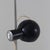 Floor lamp in chromed and painted metal with a height-adjustable and orientable light source thanks to the magnetic...