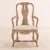A substantial pair of armchairs having graceful lines, they exhibit wonderfully carved crests and knees, comfortable and...