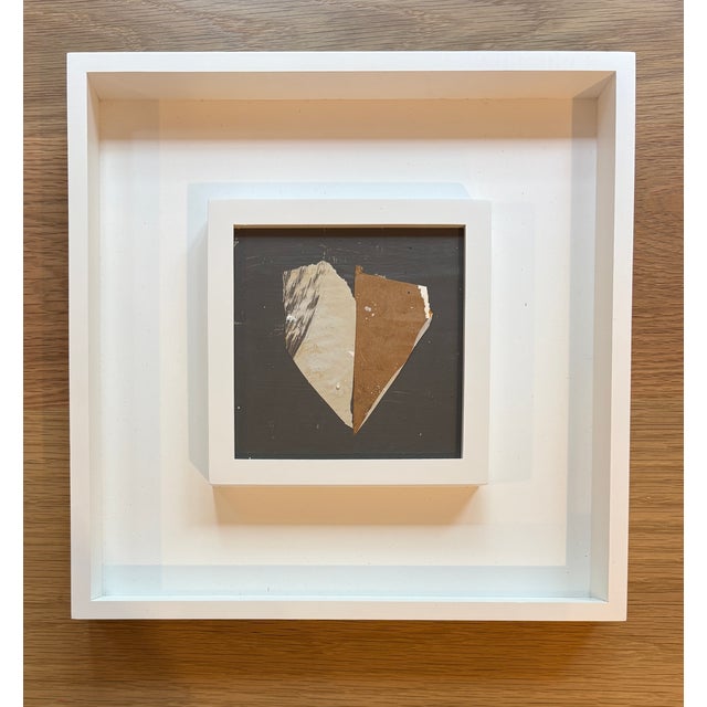 Acrylic and mixed media collage on cradled wood panel, framed in a duo style white wooden frame, 13 x 13 x 1.5.