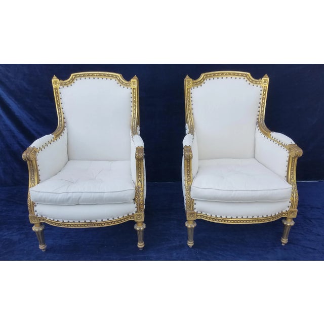 Stunning Pair of French Giltwood Bergere Chairs very comfortable and stylish. All original hand carved frames, new...