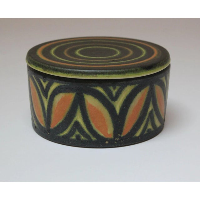 Ceramic round box / lidded jar with concentric circle and petal motif by Raymor (ca. 1960s, Italy). Attractive palette and...