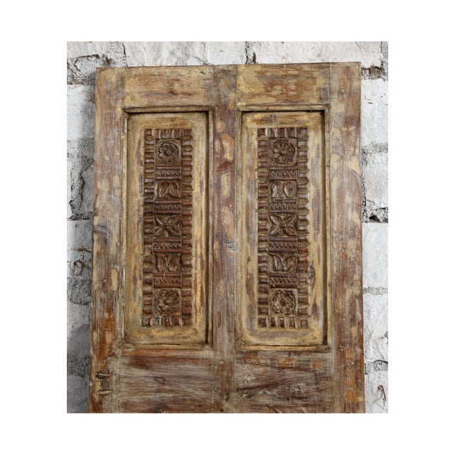 Transform your home with this vintage carved wooden door panel, beautifully adorned with intricate floral motifs and rich...