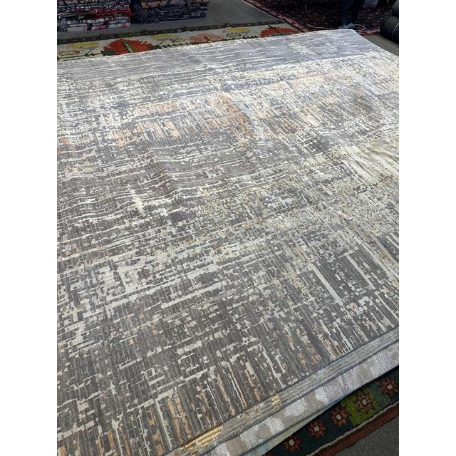 Modern Abstract Wool Rug – Hand-Knotted in Nepal, 10x14 This oversized 10' x 14' modern rug is hand-knotted in Nepal using...