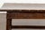 An English Georgian period walnut bench from the early 19th century, with lift top and cross motifs. Created in England...