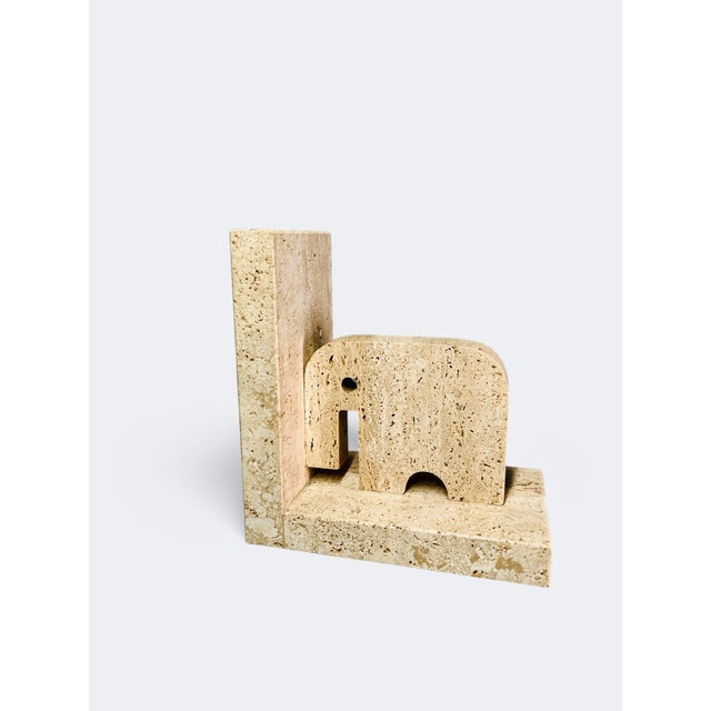 Beautiful "Elephant" travertine book end designed by Enzo Mari for Fratelli Mannelli, Italy I have official proof of...