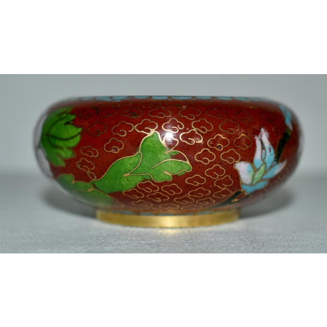Vintage (1980's) Mini Cloisonné Bowl is Chinese. MultiColored Enamel with Floral details. The Measurements: 3"Dia. x 1.5"H...
