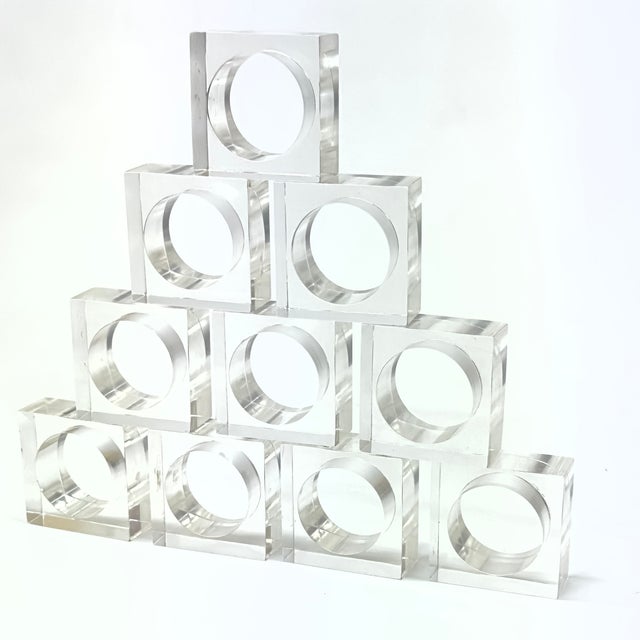 Clear lucite napkin rings, set of 10. This is a gorgeous set of minimal mid-century modern lucite clear napkin rings with...