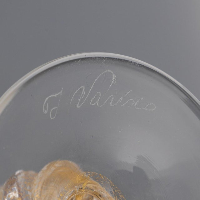 A mid-20th century set of 12 drinking glasses and 2 carafes. The varisco family, renowned master glassmakers since 1930,...