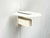 Minimalist wall lights from the Danish manufacturer Lyskaer, designed by Jørgen Klinkby. The design impresses with its...