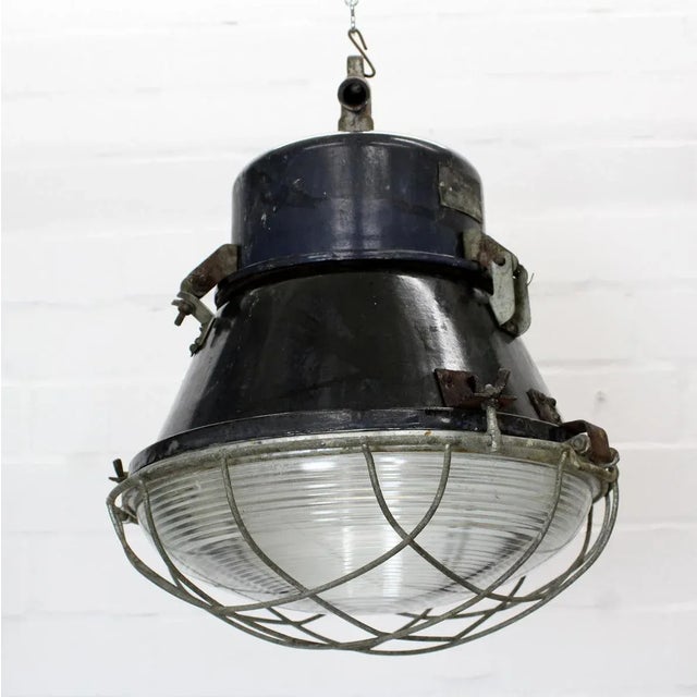 - Large industrial ceiling lamp from an old factory - Dates to 1966 - Bauhaus style - Original condition - Supplied with...