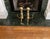This is a pair of Classic Cast Brass Andirons in the Chippendale style featuring ornate shiny solid brass construction...