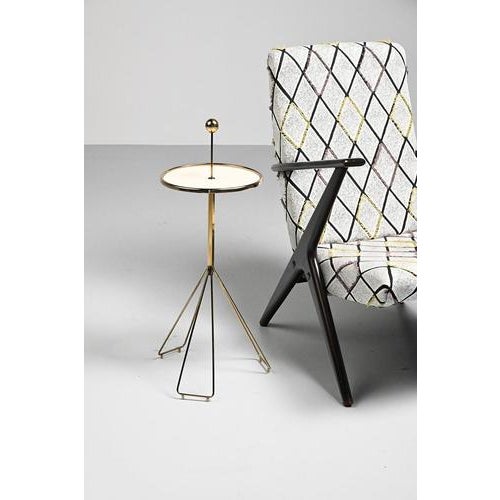 Vintage brass side table; 50’s German design. Subtil and eyecatcher at the same time. In a good vintage condition....