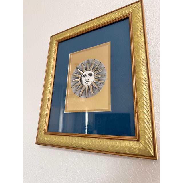 An exceptional, vintage mid-to-late 20th-century framed print from the iconic Piero Fornasetti "Soli" (Suns) series. This...