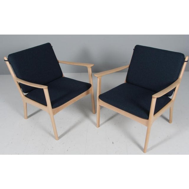 Ole Wanscher lounge chair new upholstered in blue wool. Made of solid soap treated beech. Model PJ 112, made by Poul...