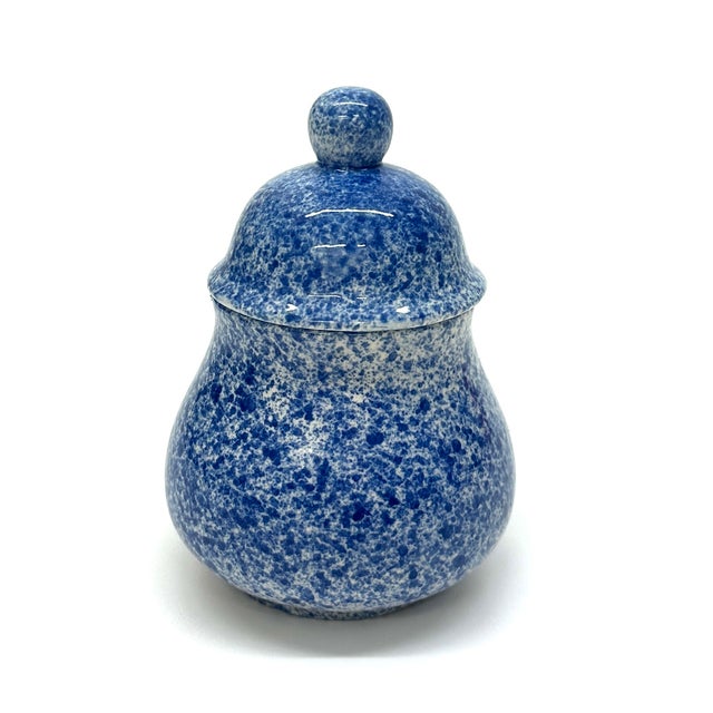 Blue & white sugar bowl & creamer set. This mid-century ceramic sugar bowl and creamer set features a classic blue and...