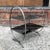 1930s 1930s Art Deco Etched Steel and Ebony Glass Two-Tier Side Table For Sale - Image 5 of 9
