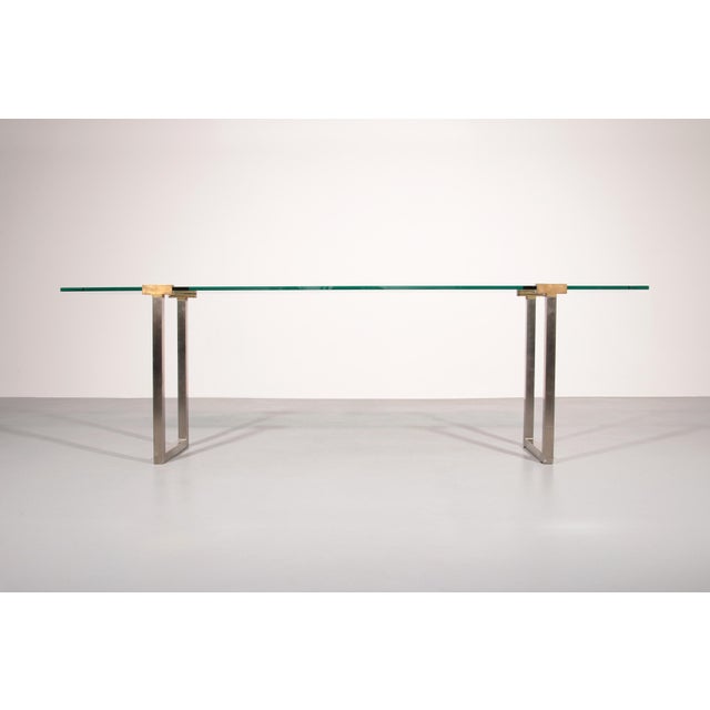 The T54 Side table, designed by renowned designer Peter Ghyczy and produced in the Netherlands, exemplifies timeless...