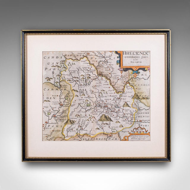 This is an antique map of Brecknoc (modern - Breconshire). An English, framed regional map by Christopher Saxton, with...