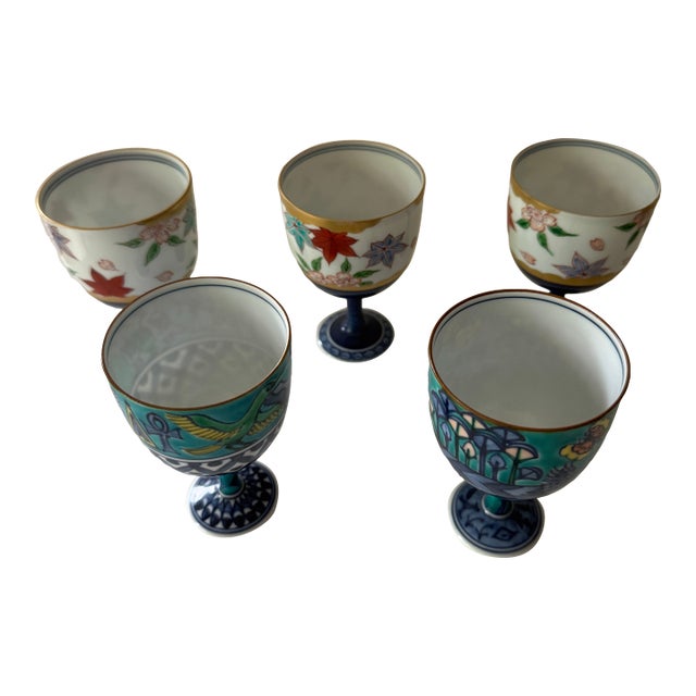 Mid 20th Century Set of 5 Japanese Porcelain Footed Sake Goblets — Hand-Painted, Arita Style — Autumn, Garden & Egyptian Motifs For Sale