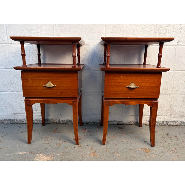 Distinctive and architectural, these mid-century Pagoda nightstands by R-Way Furniture beautifully reflect Chinoiserie-...