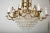 Early 1920's French Empire-style gold metal chandelier with original cut crystals. Wired for US use and in working...