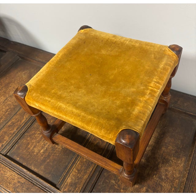 This charming antique English stool blends timeless craftsmanship with a surprisingly modern twist. The beautifully turned...