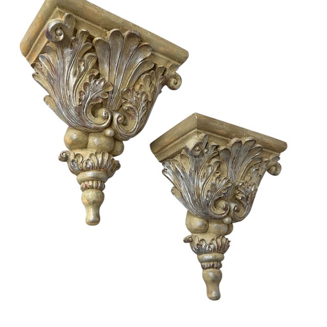 Offered as a pair vintage acanthus baroque style wall bracket display shelves. Beige back ground with red under glaze...