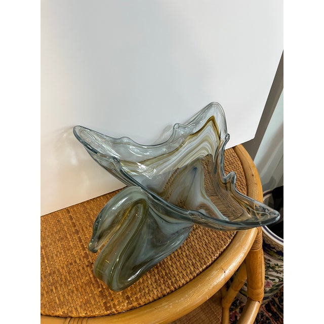 Beautiful hand blown glass swirl swan bowl in green and brown. Bowl is in a triangular shape measuring approximately 11” x...