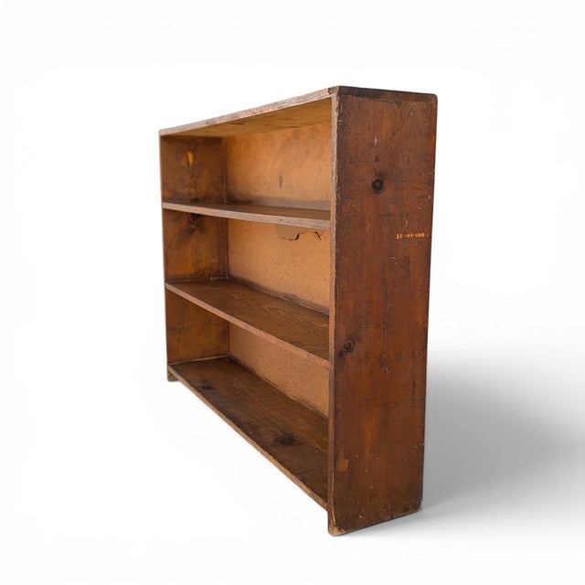 Vintage Primitive Rustic Low Wood Bookcase No. 57B. A low, wide vintage wood bookcase with open shelving and a shallow...