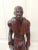 It is signed on the back. G. B. It appears to be made of rosewood. It depicts Buster Crabbe in a swimsuit. It measures 18"...