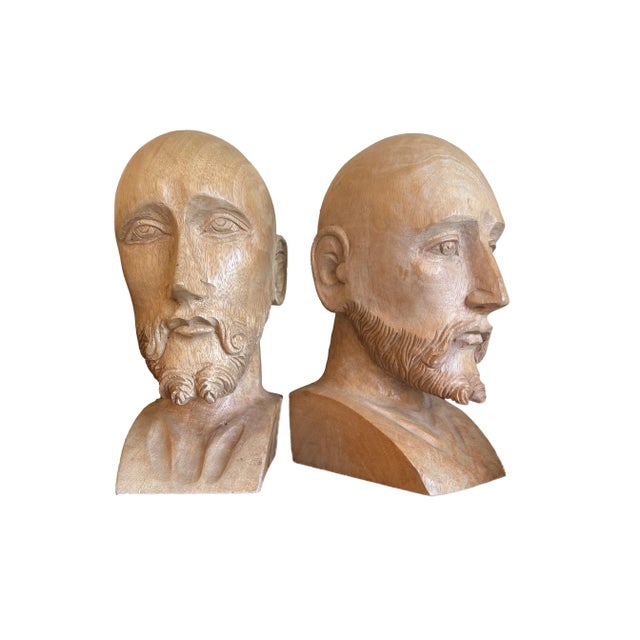 A remarkable pair of hand-carved distinguished gentlemen! Each bust, unique in its depiction, captures the essence of...