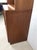 This mid century modern shelving unit by Basic-Witz features hardwood construction, walnut veneer with original finish,...