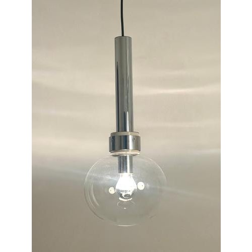Large staff pendant light designed by motoko ishii distinctive 1970s space age design chrome-plated fixture clear glass...