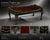 A bold, designer-forward interpretation of a classic form, this striking coffee table pairs traditional craftsmanship with...