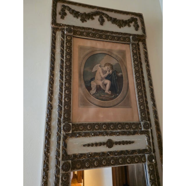 Great looking mirror with inserted cupid drawing.