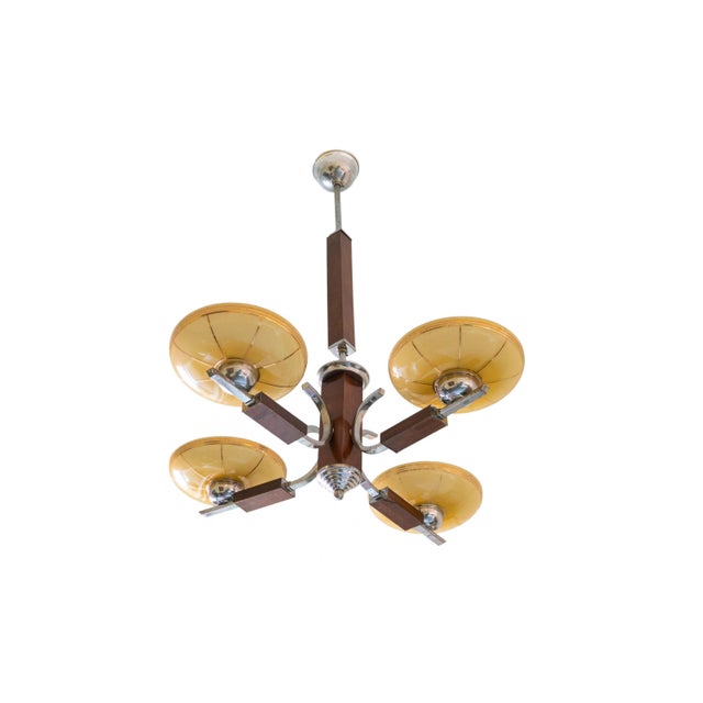 Yellow Art Deco ceiling lamp from Czechoslovakia, crafted in the 1930s, embodies the elegance and geometric forms of the...