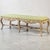 This is a French Provincial style cerused bench in green damask. The apron is heavily carved and in good condition. The...