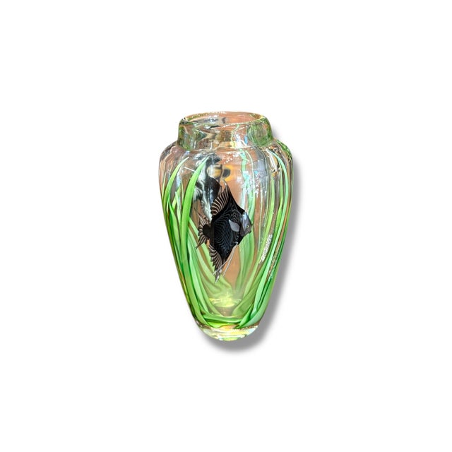This Orient & Flume blown glass angelfish vase is a striking example of studio art glass, showcasing the brand’s signature...
