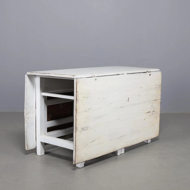 Gustavian folding table from the 19th century! Fitted folding table made of pine with double gates. You can unfold the...