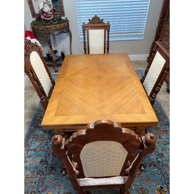 French Antique-Style Oak Draw-Leaf Dining Table with 4 Chairs Beautiful solid oak draw-leaf dining set in classic French...