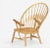 Hans J. Wegner for Johannes Hansen Peacock Chair made in Denmark, 1947 Ash frame with Teak arms and grass cord seatBranded...