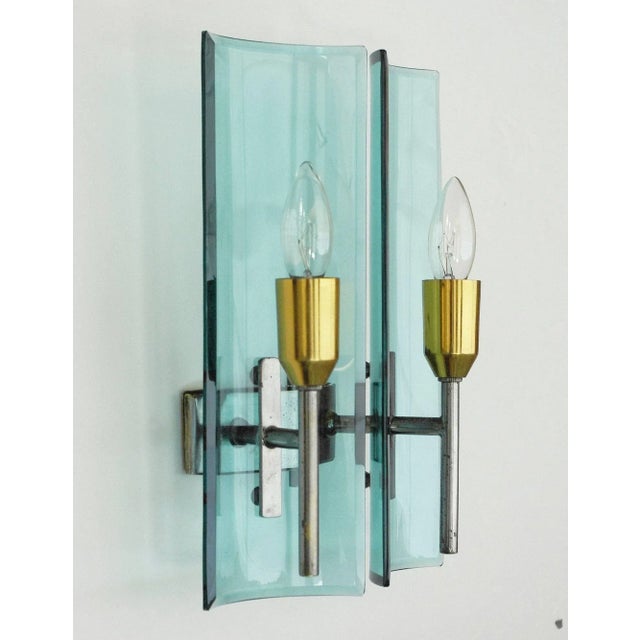 Vintage Italian sconces with two curved and beveled rectangular shaped glasses / Designed by Cristal Arte, circa 1960's /...