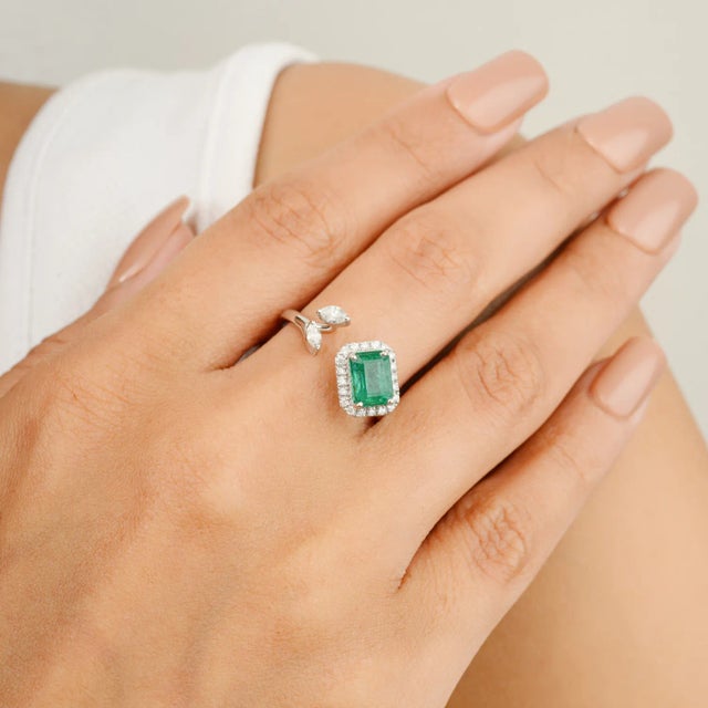 Designer Emerald Diamond Open Ring for Wedding in 14K Gold featuring natural emerald of 1.04 carats and diamonds of 0.24...