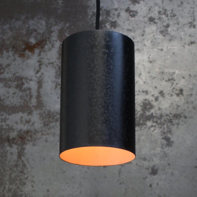 Mid-century black danish minimalist cylinder metal pendant lamps by eila & john meiling. Manufactured by louis poulsen in...