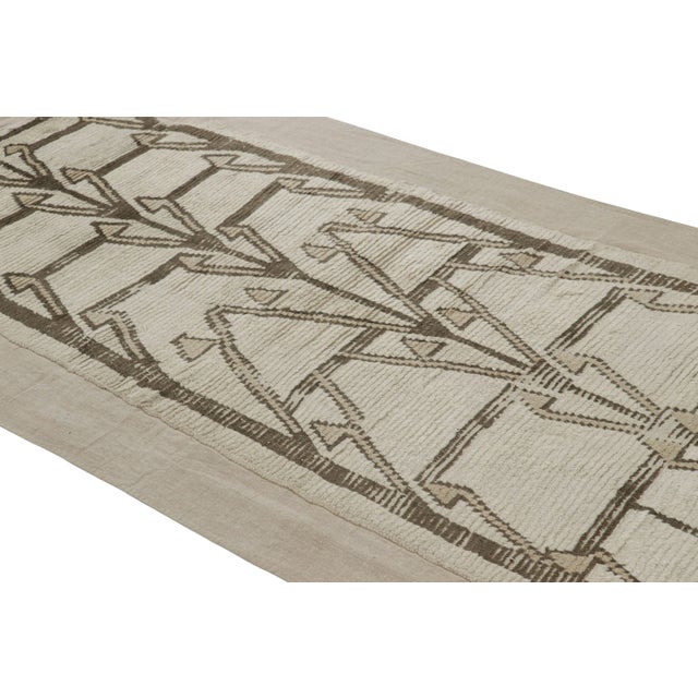 This 4x10 vintage rug is one of a rare set of exceptional works curated by Rug & Kilim—each a unique marriage of mid-...