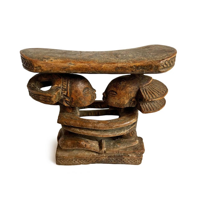Antique carved wood headrest from the Luba people of Democratic Republic of Congo. Headrests were personal items meant to...