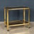 An elegant French drinks trolley dating from the 1970s, attributed to Maison Jansen. The refined rectangular frame is...