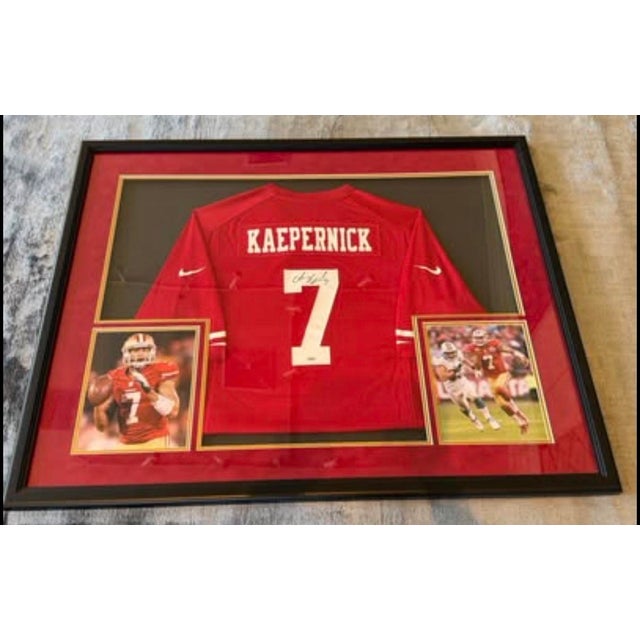 Cool framed Colin Kaepernick autographed jersey. Has his signature on the number 7. Comes with two photos of him playing...