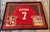Cool framed Colin Kaepernick autographed jersey. Has his signature on the number 7. Comes with two photos of him playing...